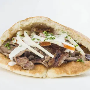 a pita sandwich with meat and cheese