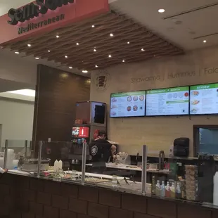 a view of a restaurant counter