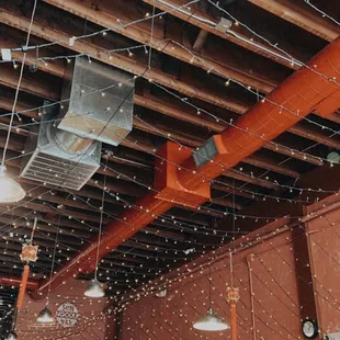 a ceiling with lights hanging from it