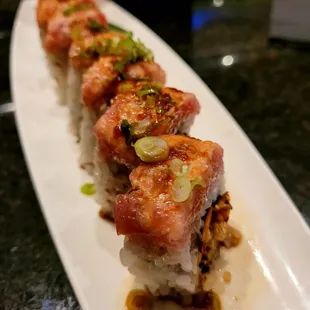 a sushi roll on a plate
