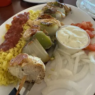 Chicken kebab with rice and pita
