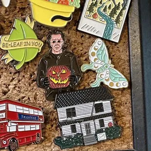a collection of halloween pins