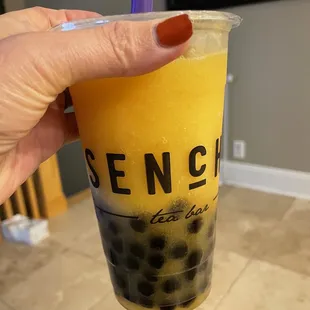 Mango slush with tapioca pearls delivered from doordash