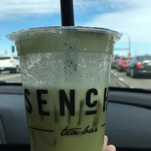Mango matcha with tapioca pearls on ice.