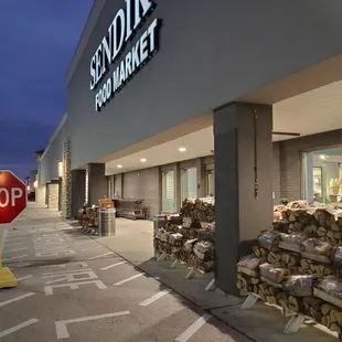 a stop sign in front of the store