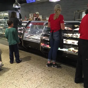 Many red shirts and the manager