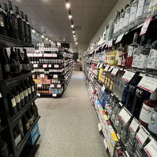 aisle of wine bottles