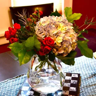 a vase of flowers on a table