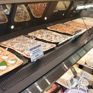 a variety of pizzas