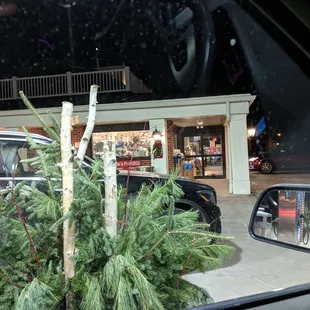 Okay so the fancy greenery beside the gas pump might be a giveaway that this is not a simple gas station but is an upscale grocery.