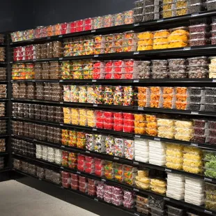 a display of fruit and candy