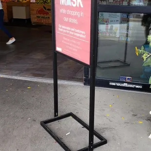 a sign in front of a store