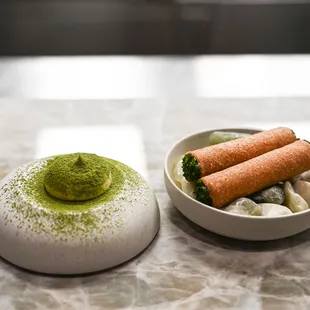 a bowl of food and a small bowl of food