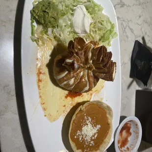 Chicken chimichanga with refried beans