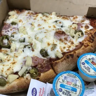 a slice of pizza in a box