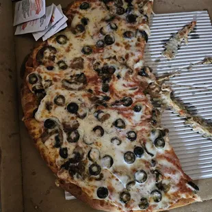 Why does it look like that, and yes, I did still eat it because they make good pizzas when they are made right. Please fix.