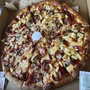 Pepperoni, pineapple and mushroom pizza