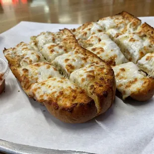 9. Garlic Bread with Cheese and a side of Seniore Sauce