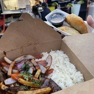 Loma saltado and empanadas