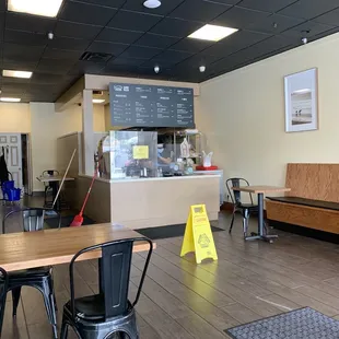 a restaurant with tables and chairs