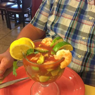 a man sitting at a table in a restaurant