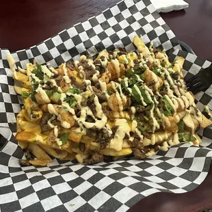 Surf and turf fries . Shrimp style swapped shredded cheese for nacho cheese.