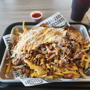 Rise and Shine Fries...with 2 overeasyeggs. Dang good and huge