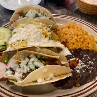 Combo De Tacos with two street tacos and a Tex-Mex taco.