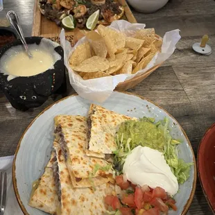 Carne Asada quesadilla, Surf N Turf Tacos, white queso