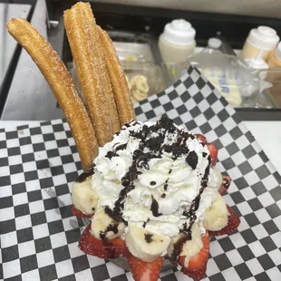 strawberries, whipped cream, and chocolate