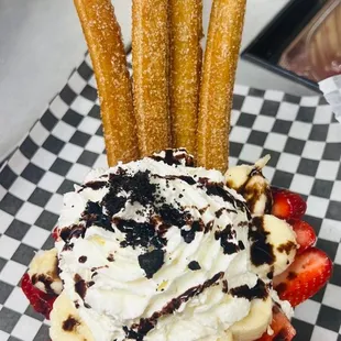 strawberries, whipped cream, and chocolate