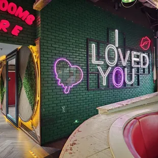 a neon sign that says i loved you