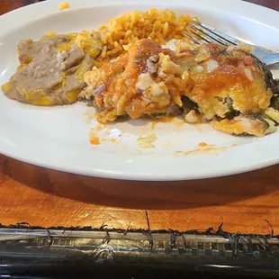 Beans, rice, and a 1/2  of steak fajita stuffed plabano pepper.