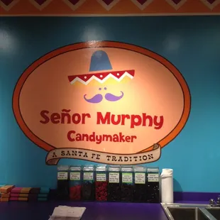 a sign for a candy shop