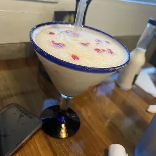 a drink in a martini glass