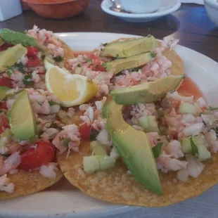 Tostadas de ceviche....  I've never ordered these before ... super light and refreshing for summer. My new regular order.