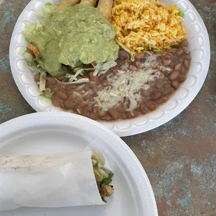 3 taquito plate and a chicken taco