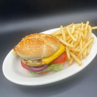 a hamburger and fries on a plate