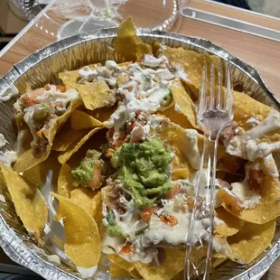 Meatless nachos.  white queso and guacamole was really good!