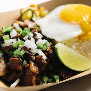 sisig plate with a fried egg