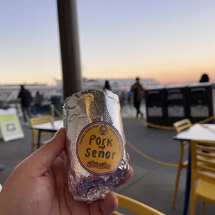 Half cut of my Señor Sisig Burrito at Señor Sisig in San Francisco&apos;s Ferry Building.