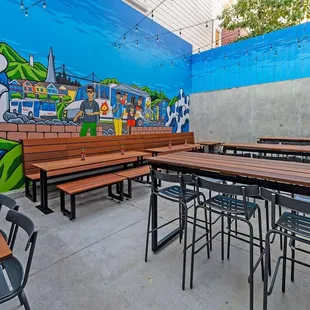 Outdoor Patio with mural by Aaron Kai