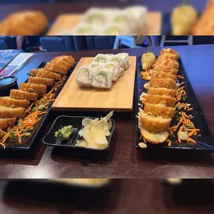 The Carne Asada Roll s are on the side and in the middle is the California Roll with the wasabi and ginger in front