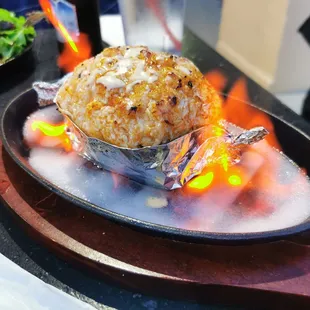 The Tski Yaki roll that comes out on fire. If you like crab salad you will love this!