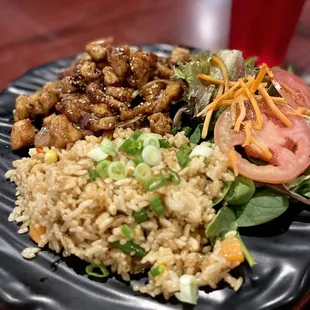 a plate of rice and vegetables