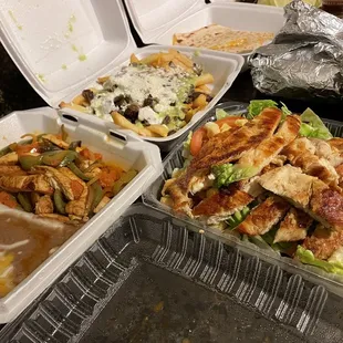 Grill chicken salad, chicken fajita plate, asada fries, quesadilla &amp; tacos in the distance