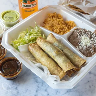 Flautas Plate (take-out) - this was more like taquitos than the light crispy flour kind of flautas. 3/5