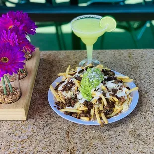 Carne asada fries &amp; a house margarita !