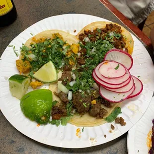 Chicken, steak, and pork tacos