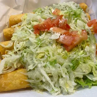 Chicken rolled tacos